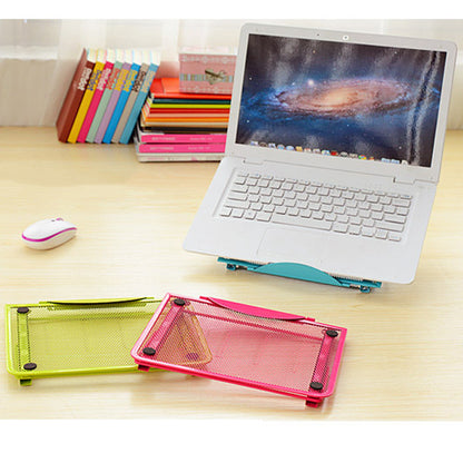 View of the four anti-slip soft pads on the base of the foldable iron laptop stand