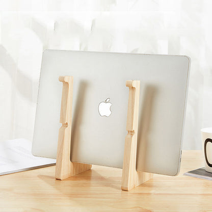 Artisan wooden laptop stand supporting a 13-inch MacBook on a minimalist wooden desk