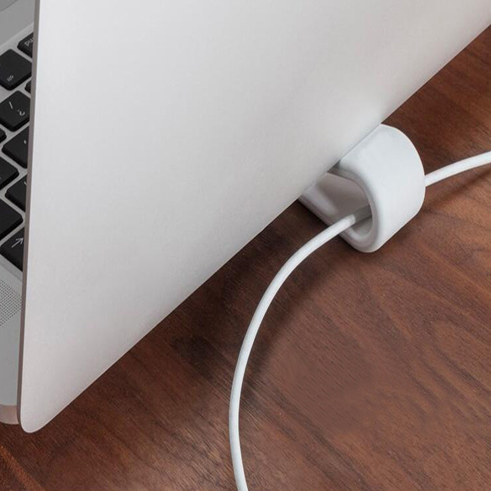 Side view showing the ergonomic angle of the portable laptop stand