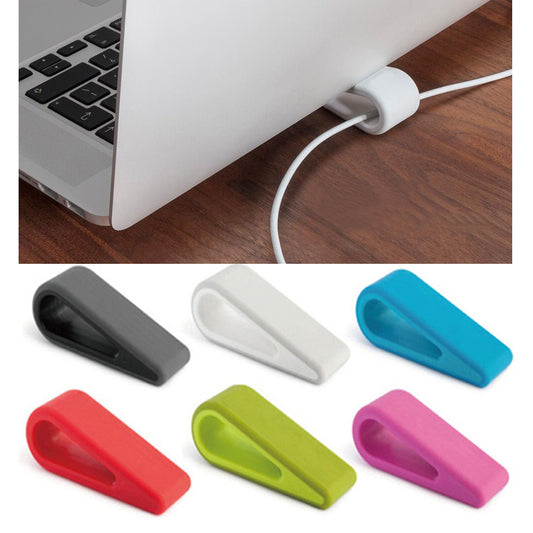 Compact portable laptop cooling stand raising a laptop for better ergonomics